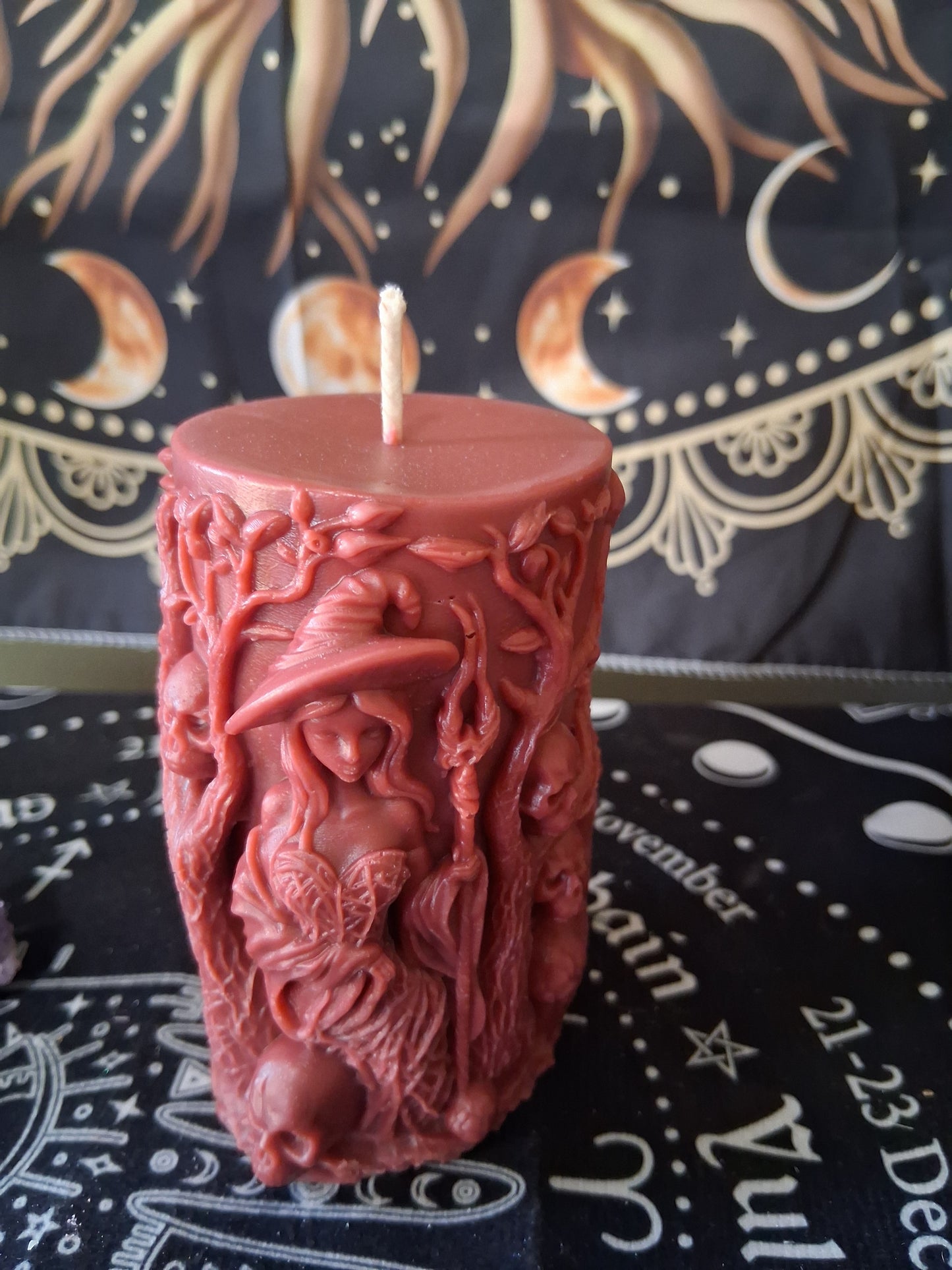 Sacred Moon Candle Co Siren's Blossom scented witch pillar candle in detailed red wax design