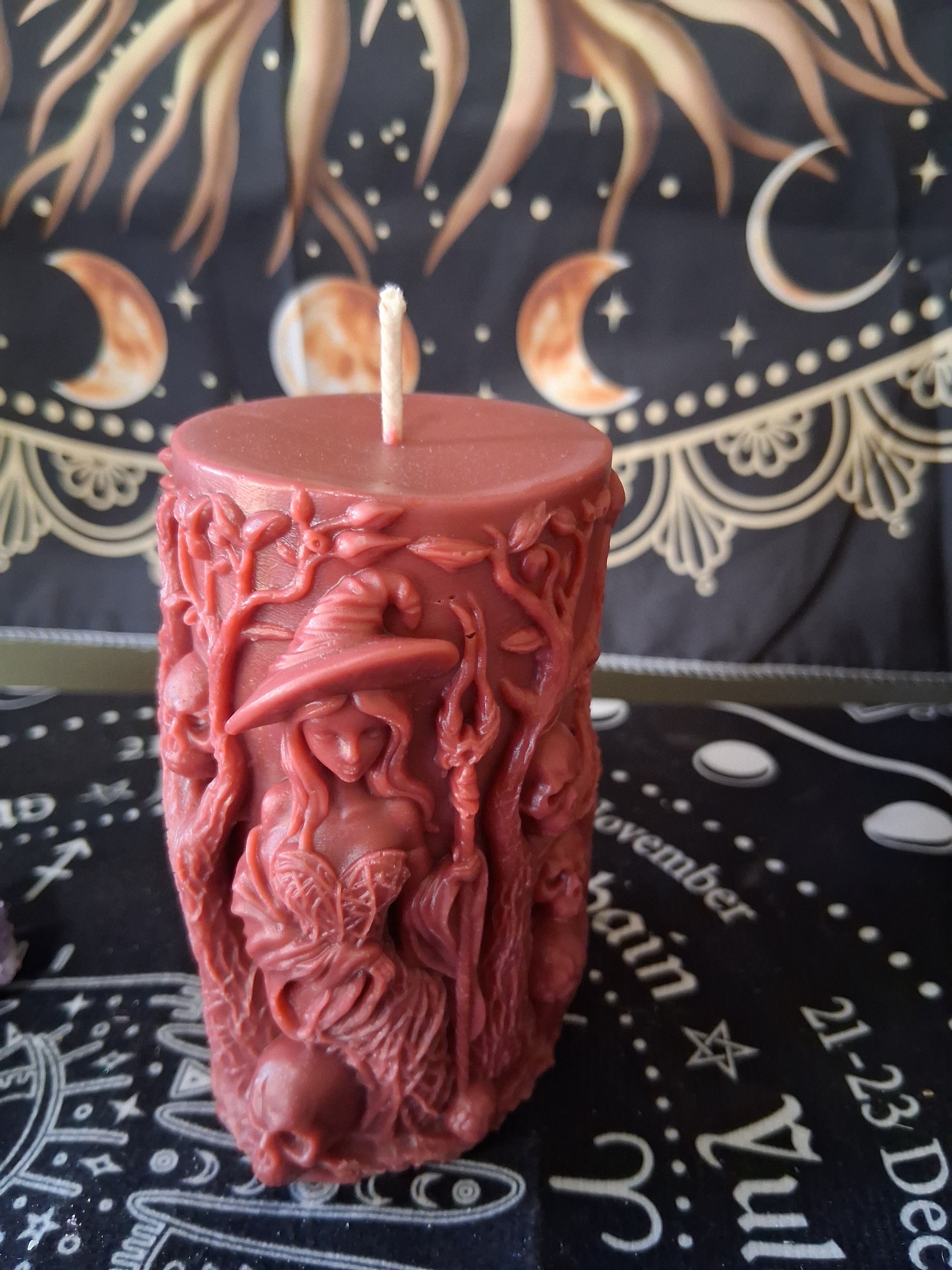 Sacred Moon Candle Co Siren's Blossom scented witch pillar candle in detailed red wax design