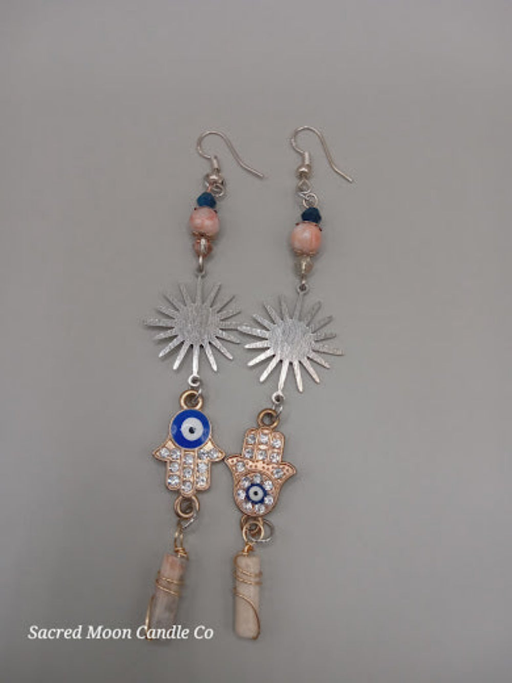 Sacred Moon Candle Co Sunburst Hamsa evil eye earrings with beads and dangling charms