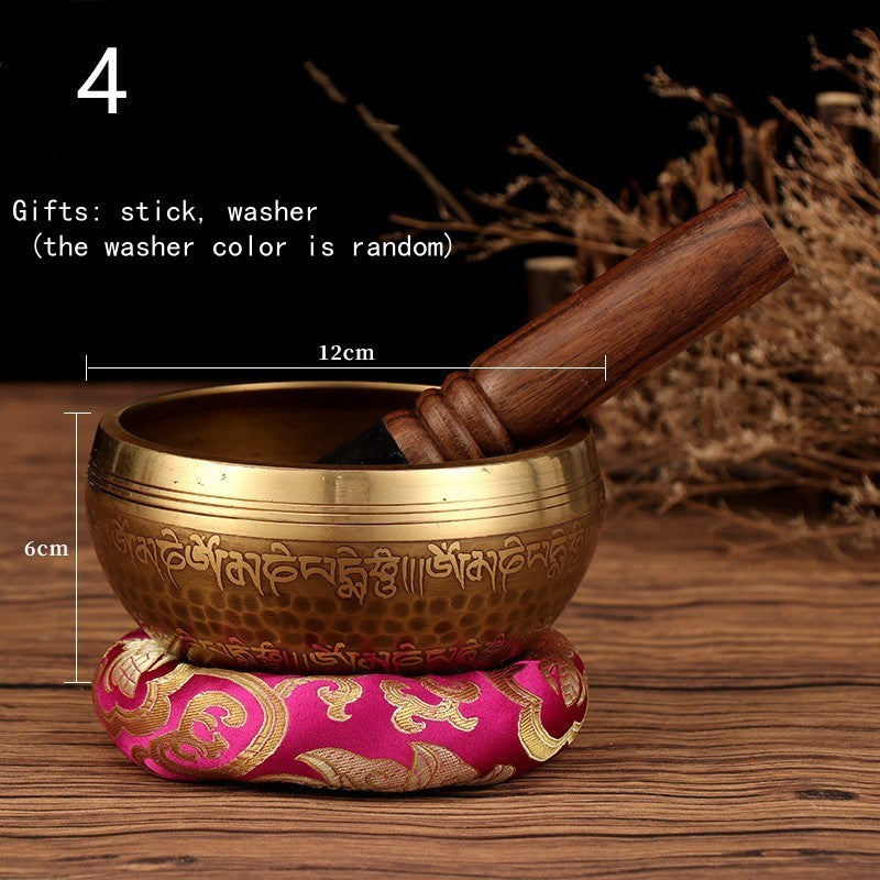 Tibetan Buddha mantra bowl with wooden stick and pink cushion from Sacred Moon Candle Co