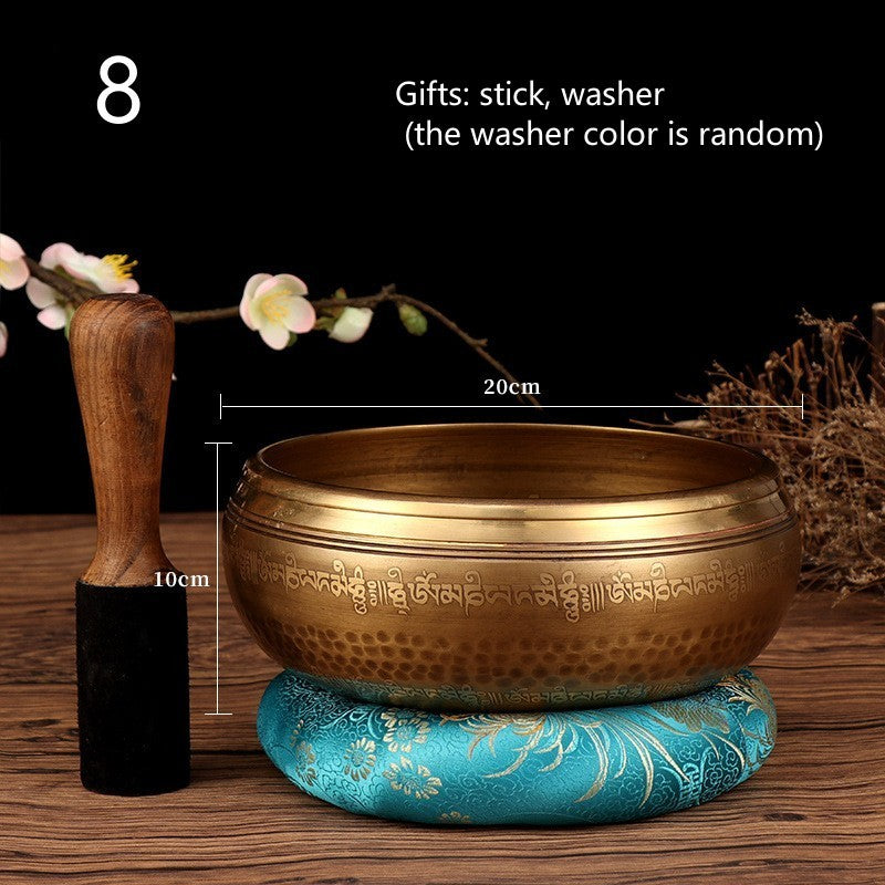 Tibetan Buddha mantra bowl with wooden stick and blue cushion, bronze singing bowl with engraved mantra