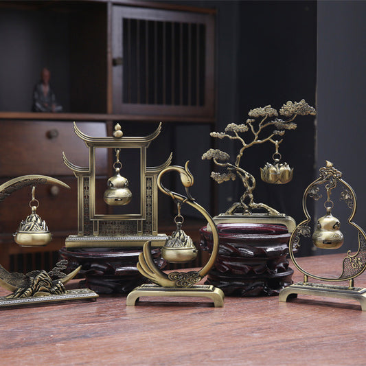 Sacred Moon Candle Co tranquility and prosperity incense burner set with intricate brass designs on wooden stands