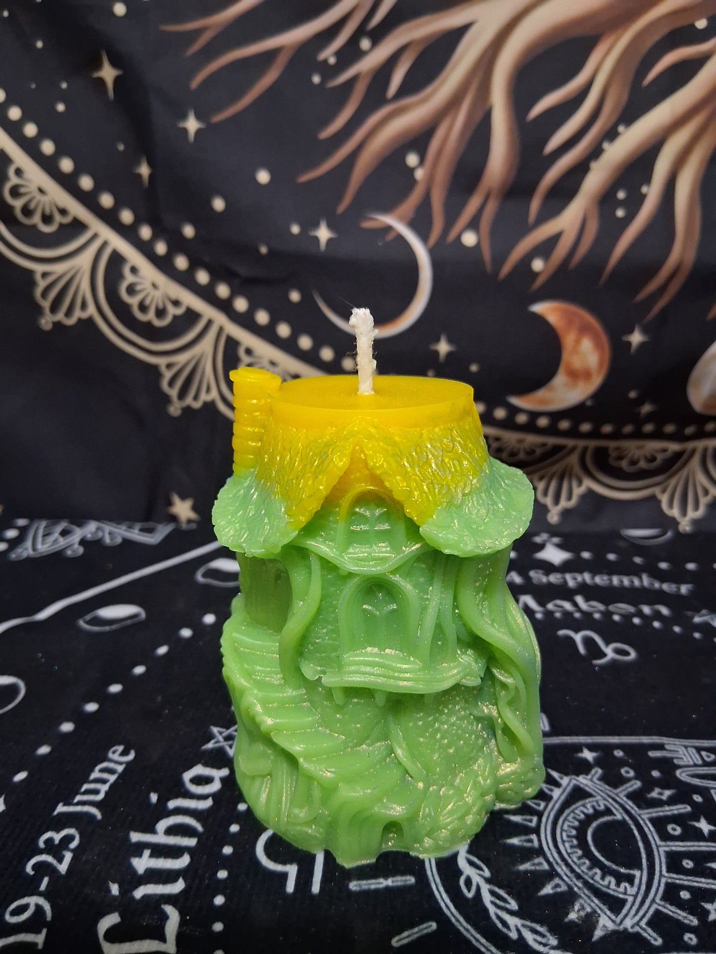 Sacred Moon Candle Co Citrus Canopy Hidaway Treehouse Candle in green and yellow with intricate treehouse design