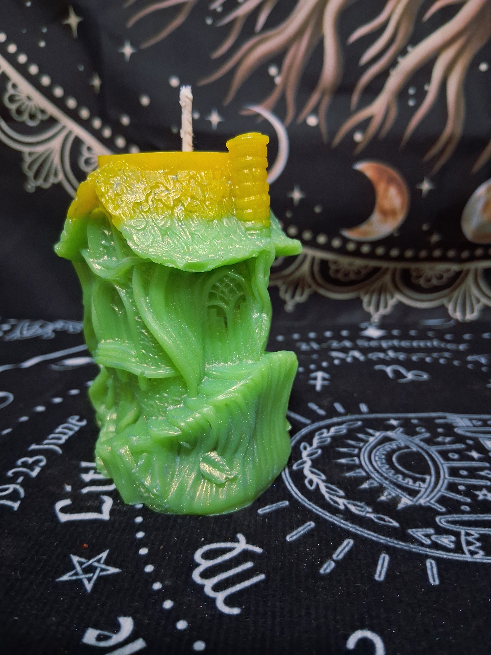 Citrus Canopy Hidaway Treehouse Candle by Sacred Moon Candle Co in green and yellow with intricate treehouse design