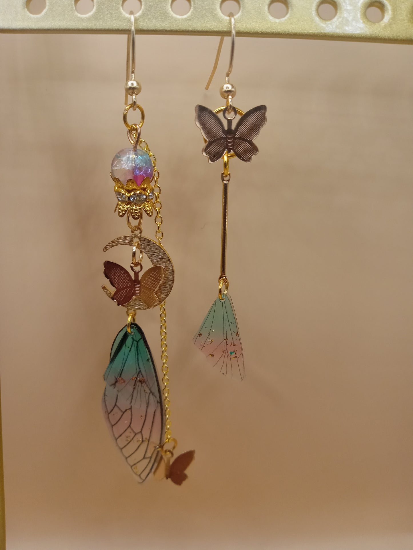 Sacred Moon Candle Co fairy wing earrings with butterfly and delicate gradient wings design