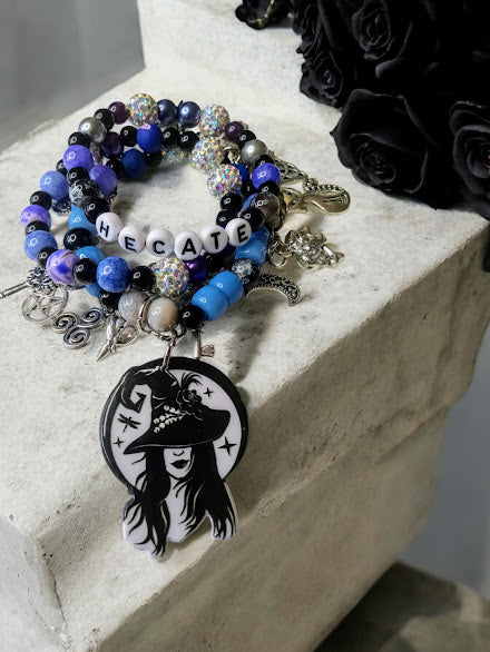 Sacred Moon Candle Co Hecate charm bracelet with beaded design and witch silhouette pendant
