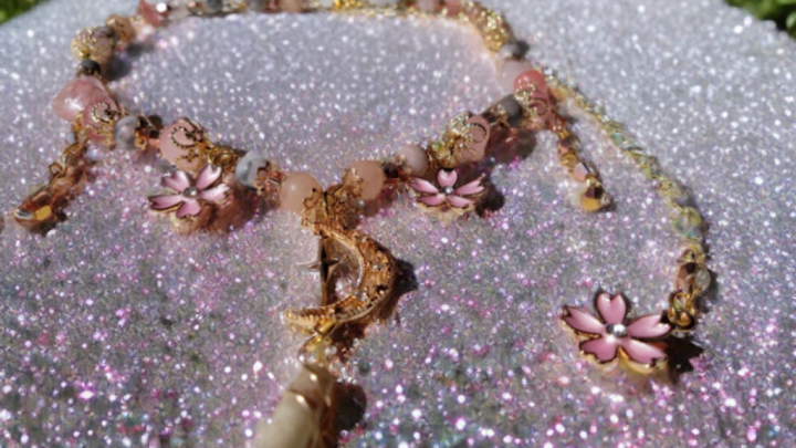 Sacred Moon Candle Co sakura blossom moon choker with pink flower charms and crescent moon pendant