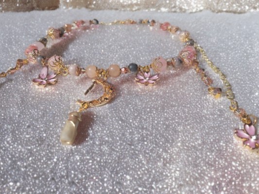 Sacred Moon Candle Co sakura blossom moon choker with pink beads and gold crescent moon charm