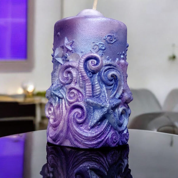 Sacred Moon Candle Co water lily jasmine scented candle with purple ocean wave and starfish design