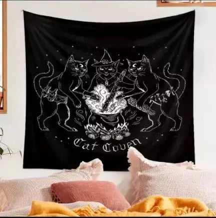 Sacred Moon Candle Co witchy cat tapestry showing three black cats around a glowing cauldron on a black background