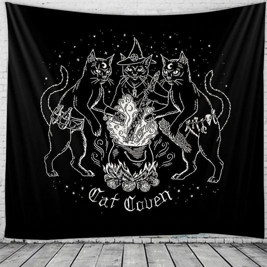 Black witchy cat tapestry featuring three mystical cats around a boiling cauldron with Cat Coven text